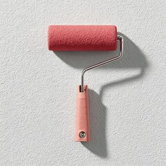 Obraz premium Pink paint roller on light gray wall