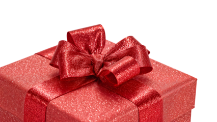 Glittery red gift box with shiny satin ribbon bow isolated on the transparent background for celebration, birthday, or holiday present packaging