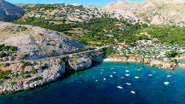 Campsite at Campig Skrila, Krk Island, Stara Baska Croatia, Aerial View of the Mountains and Coast With Boats, Beaches and Adriatic Sea. The Seaside Rv Campmobiles on a Summer Beautiful Coastline