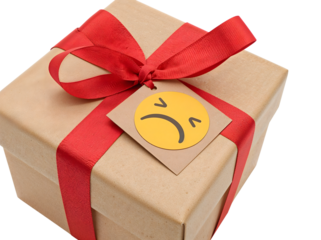 Brown gift box with red ribbon and sad emoji tag isolated on the transparent background, concept of unwanted or disappointing present