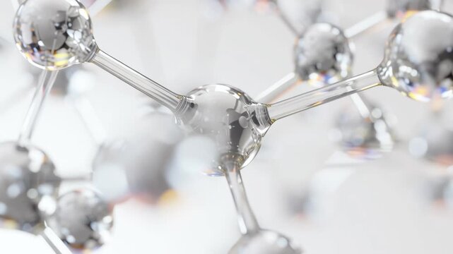 Crystalline transparent silver molecule structure on white background. Molecules are connected by thin transparent threads. Laboratory, scientific background, research