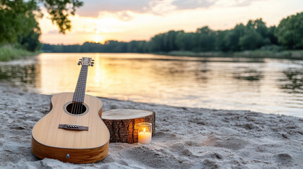 Wooden guitar rests on sandy riverbank at sunset, creating serene atmosphere