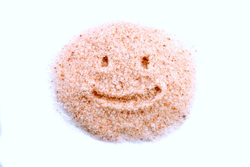 Pink Himalayan Salt in a clear glass bowl on a white background. Pink salt has more minerals that are beneficial to the body than regular table salt.