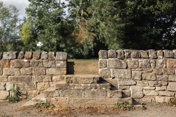 Authentic English countryside with roman wall, heritage travel