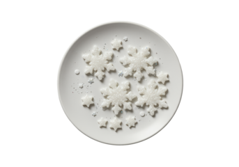 Delicate, intricate edible sugar snowflakes and stars on a transparent ceramic plate with iridescent glitter, top-down studio macro shot, concept of refined elegance and precision