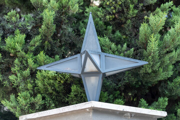 Star-Shaped Light Fixture on Pillar