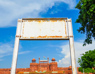 Red Fort Monument in Delhi Framed Through Empty Board Structure