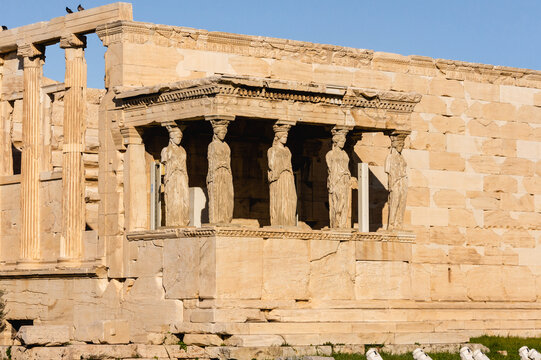 Close view of Caryatids statues at Erechtheion temple, Acropolis, Greece.
