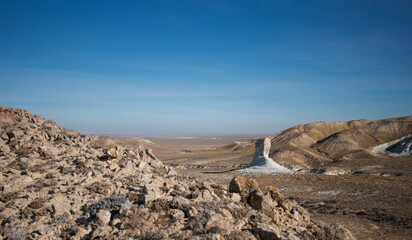 A solitary rock formation, known as a 