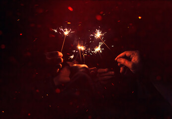 Celebrations with sparklers and fireworks, parties and mutual congratulations.
