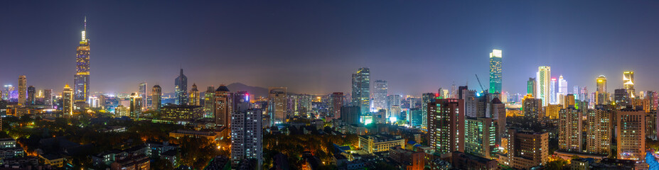 Obraz premium Modern architectural night view and city skyline panorama of Nanjing, China
