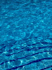 Blue Water Texture with Sunlight Reflections