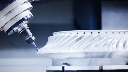 Producing precision turbine wheel part with five axis arm CNC machine