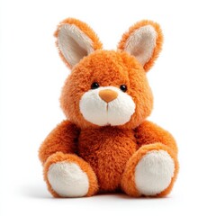 Fototapeta premium Fluffy orange plush bunny toy with big ears and white accents sitting against a white background