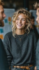 Cheerful Young Woman Engaging in Conversation in Modern Workspace
