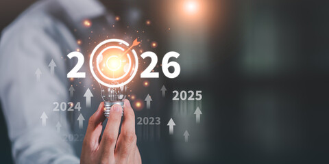 Innovation, future vision, strategic success are the foundation for long-term growth. concept captures creativity, goal setting, upward momentum in shaping a transformative business future for 2026.