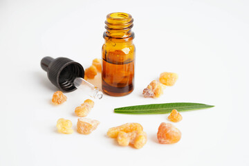 Frankincense or olibanum aromatic resin isolated on white background used in incense and perfumes.