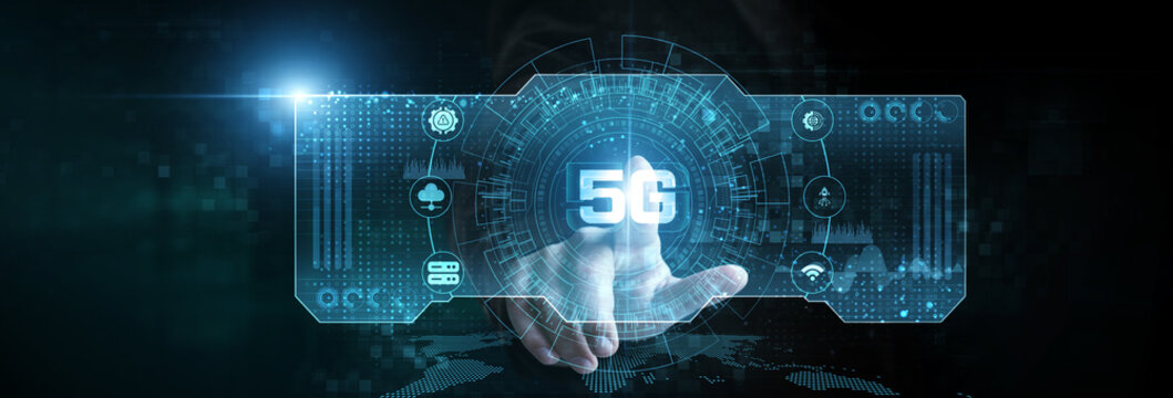 Businessman touching the 5G technology icon on the digital screen analysing data. network speed, low latency, connectivity, edge computing, smart devices. - Powered by Adobe