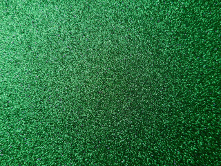 Green glitter texture background with sparkling surface