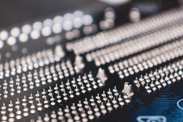 Motherboard pin contacts close-up, desktop PC. Computer technology background
