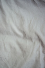Obraz premium Overhead view of natural sustainable white linen fabric Prem Textile