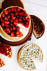 Tempting dessert platter featuring various cakes and pastries at a modern cafe setting