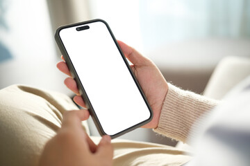 Hand holding smartphone with empty screen, for app presentation, UI design, or advertising mockup.