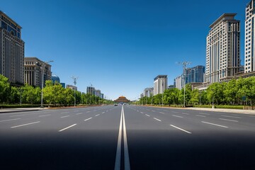 Obraz premium Urban Landscape in Asia: Modern Cityscape with Road Leading to Historical Architecture under a Clear Blue Sky
