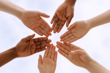Diverse Hands United in Solidarity: A Symbol of Unity, Collaboration, and Global Community Connection
