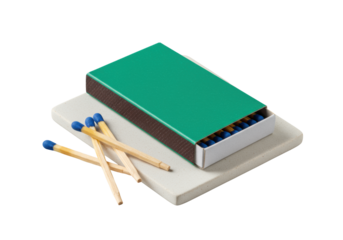 Top-down view of a vibrant emerald green cardboard matchbox angled on a smooth off-white ceramic tile, with sapphire blue-tipped wooden matches, clean product presentation concept