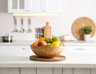 Fresh fruit bowl with colorful produce on modern white kitchen counter