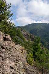 Steep rocky cliffs and forest at Karlsruher Grat in the Black Forest