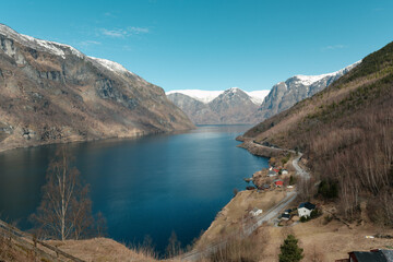 Obraz premium Majestic Norwegian Fjord Landscape with Snowy Mountains