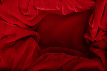 Black empty box covered with red velvet isolated on a white background.