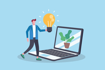 Man holding a glowing light bulb near a laptop with a plant on screen representing a new idea