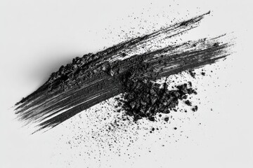 Dark streaks and powder on light background