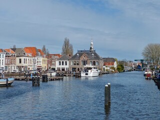 Fototapeta premium Center of the city of Leiden with a view of the building of the former Steamboat Company