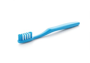 A bright, vibrant blue toothbrush lies angled on a plain white background.