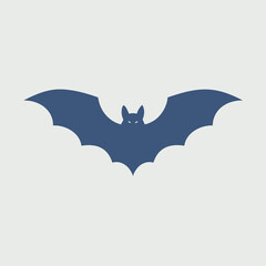 Dark blue bat silhouette with glowing eyes wings spread