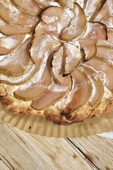 Close up texture of pear pie with white topping. Macro photography