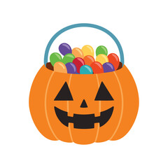 Orange pumpkin basket filled with colorful candies and a blue handle jack o lantern