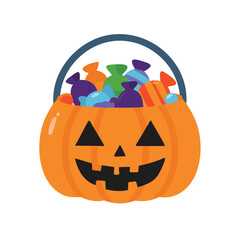 Orange pumpkin basket filled with colorful candies halloween jack o lantern