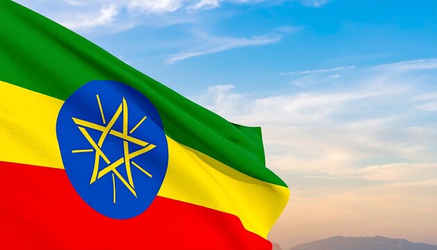 Ethiopian flag waving against a clear sky - Powered by Adobe