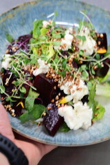 close up of fresh salad with vegetables on plate