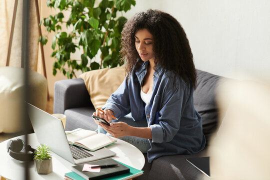 Modern remote work setup of a young woman in a stylish apartment