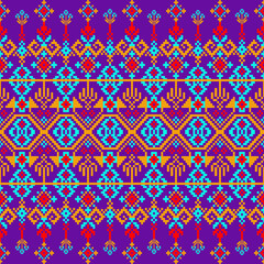 abstract seamless pattern
A vibrant ethnic textile pattern featuring symmetrical geometric shapes such as diamonds, crosses, and stylized floral motifs. The design is arranged in horizontal bands with