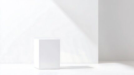 Clean study of white cube, 85mm prime at f4, uniform sharpness across face with subtle top-light highlight