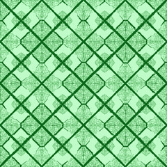Fototapeta premium Seamless green geometric lattice pattern with a textured diamond repeat for backgrounds and fabric