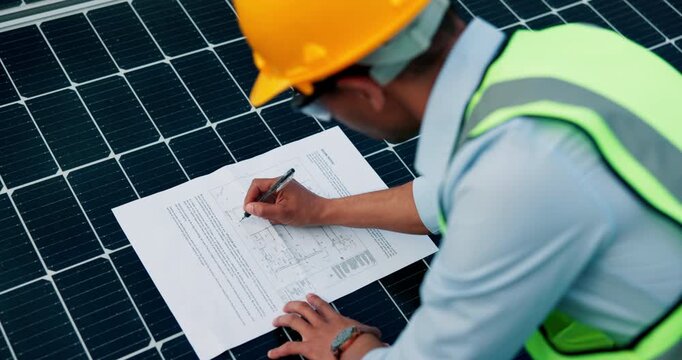 Man, engineer and writing on blueprint for solar panel design, floor plan and technical drawing. Male person, document or electrical layout for installation, photovoltaic illustration and maintenance