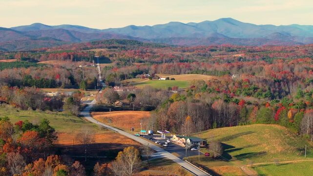 Appalachian mountains rural landscape with small town traditional general store and gas station in Long Creek, South Carolina in fall season.